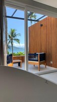 Quarto premier, 1 cama King, vista para o mar | Terraço/pátio