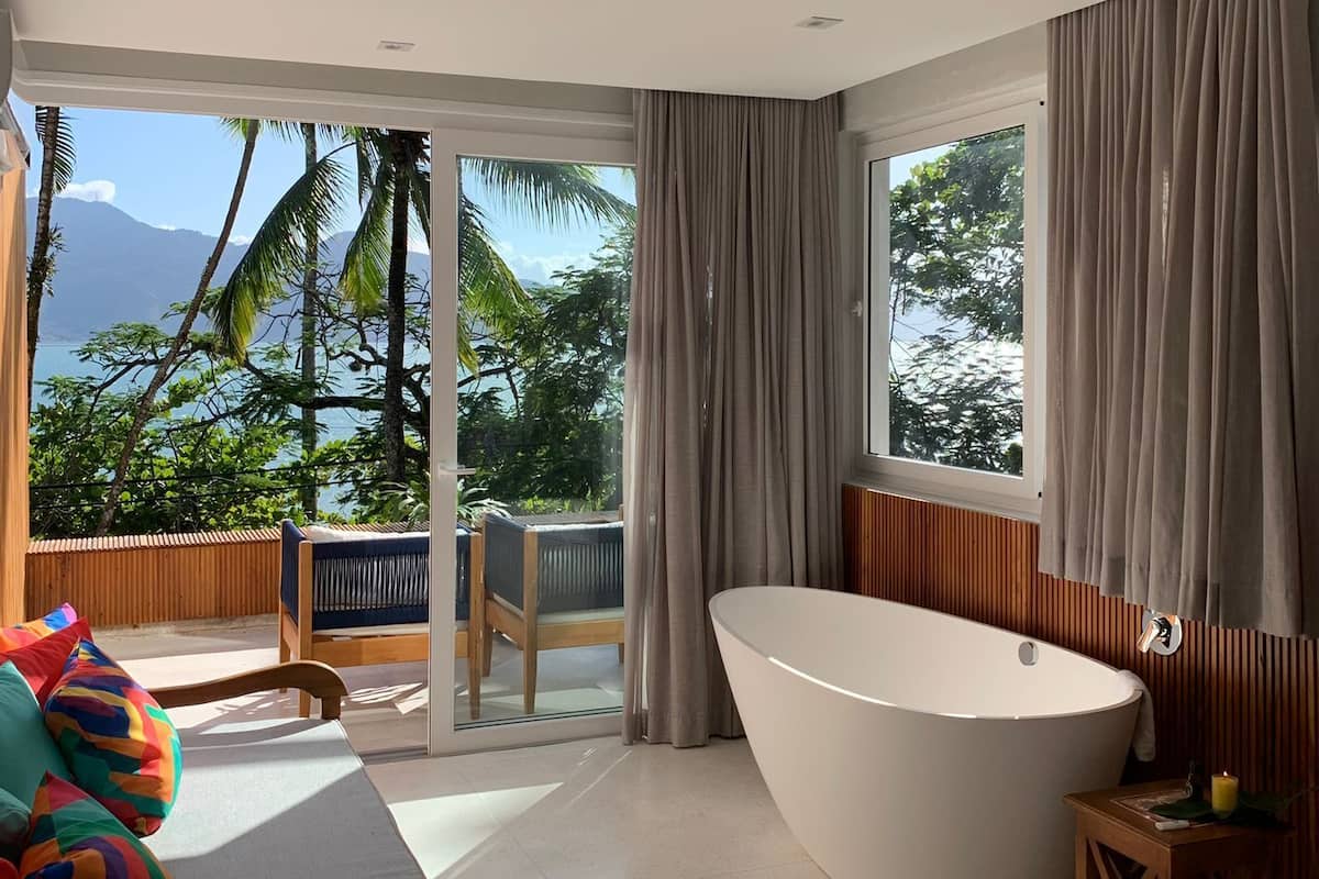 Camera Premium, 1 letto king, vista oceano | Biancheria da letto di alta qualità, materassi a doppio strato, minibar