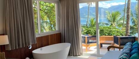 Chambre Premium, 1 très grand lit, vue mer | Terrasse/Patio