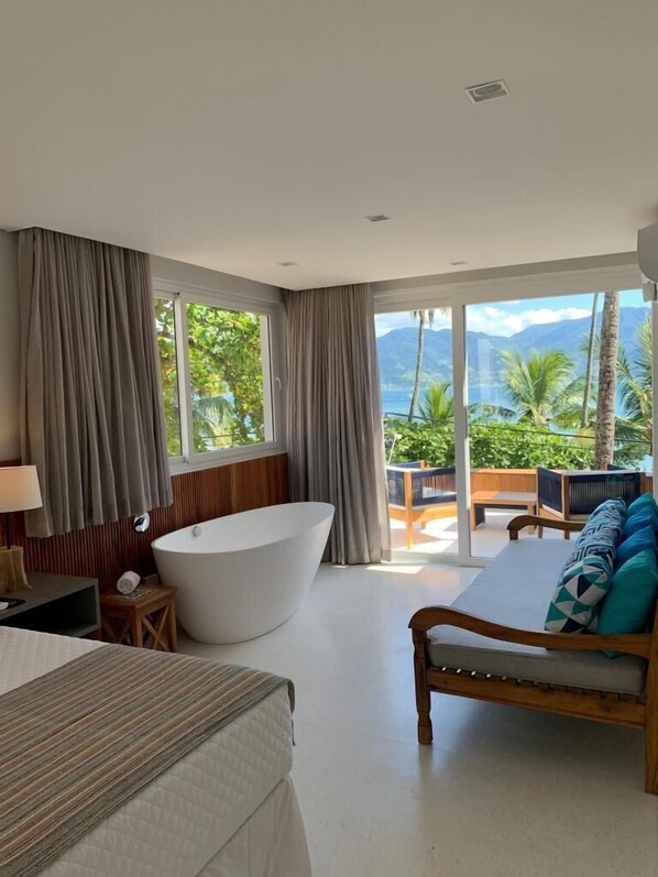 Chambre Premium, 1 très grand lit, vue mer | Terrasse/Patio