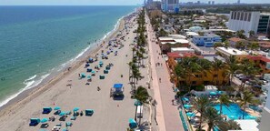 On the beach, sun loungers, beach towels