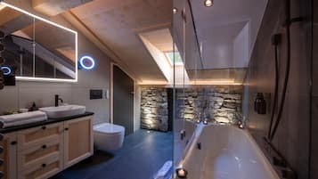 Bathtub, hair dryer, towels