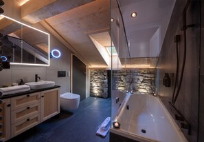Bathtub, hair dryer, towels