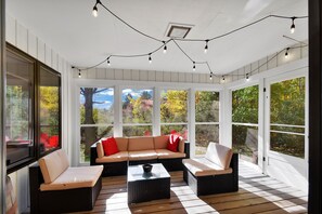 Smart TV, fireplace, books