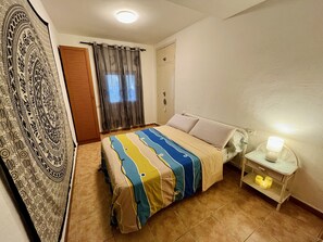 1 dormitorio, tabla de planchar con plancha, wifi gratis y ropa de cama