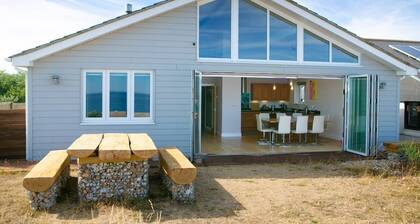 Wow I'm living on the beach. Luxury 4 bed sleeps 8