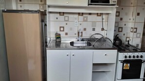 Loft clásico | Cocina privada | Frigorífico, microondas, licuadora y utensilios de cocina