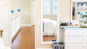 A hotel room with a bed, a mirror, a dresser, and a trash bin. - Balloons and Wine (Murrieta)