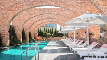 Indoor pool, seasonal outdoor pool, pool umbrellas, sun loungers