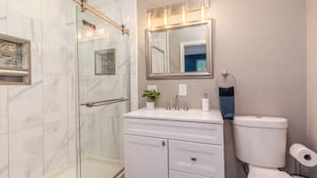 Combined shower/tub, jetted tub