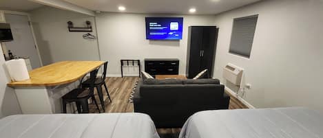Grand Double Room, Kitchenette (5) | Laptop workspace, blackout drapes, free WiFi, bed sheets
