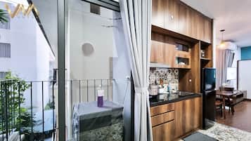Camera con letto matrimoniale o 2 letti singoli | Cucina privata | Frigorifero, microonde, piano cottura, bollitore elettrico