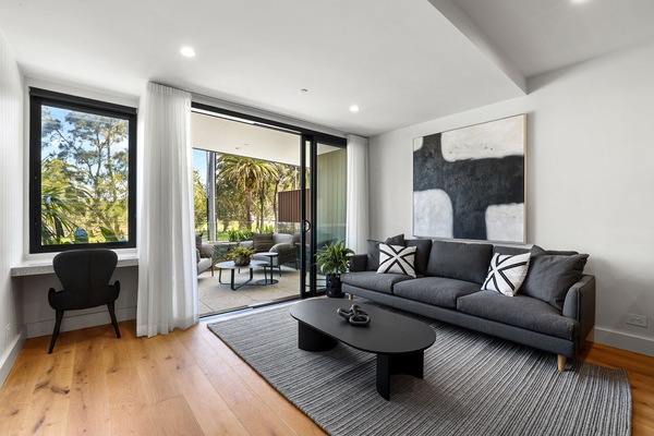Comfortable living area includes a desk and chair if you really want to work!
