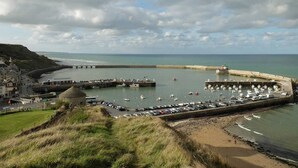 A coastal town with a marina, a pier, and a beach. - Gîte Dune between orchard and Omaha beach (Colleville sur mer)