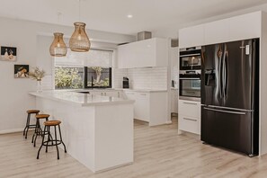 Fridge, microwave, oven, stovetop - The Little Distillery - Beachside Pool Retreat (Safety Beach)