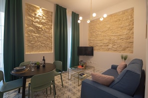 Appartement Deluxe, vue ville | Coin séjour