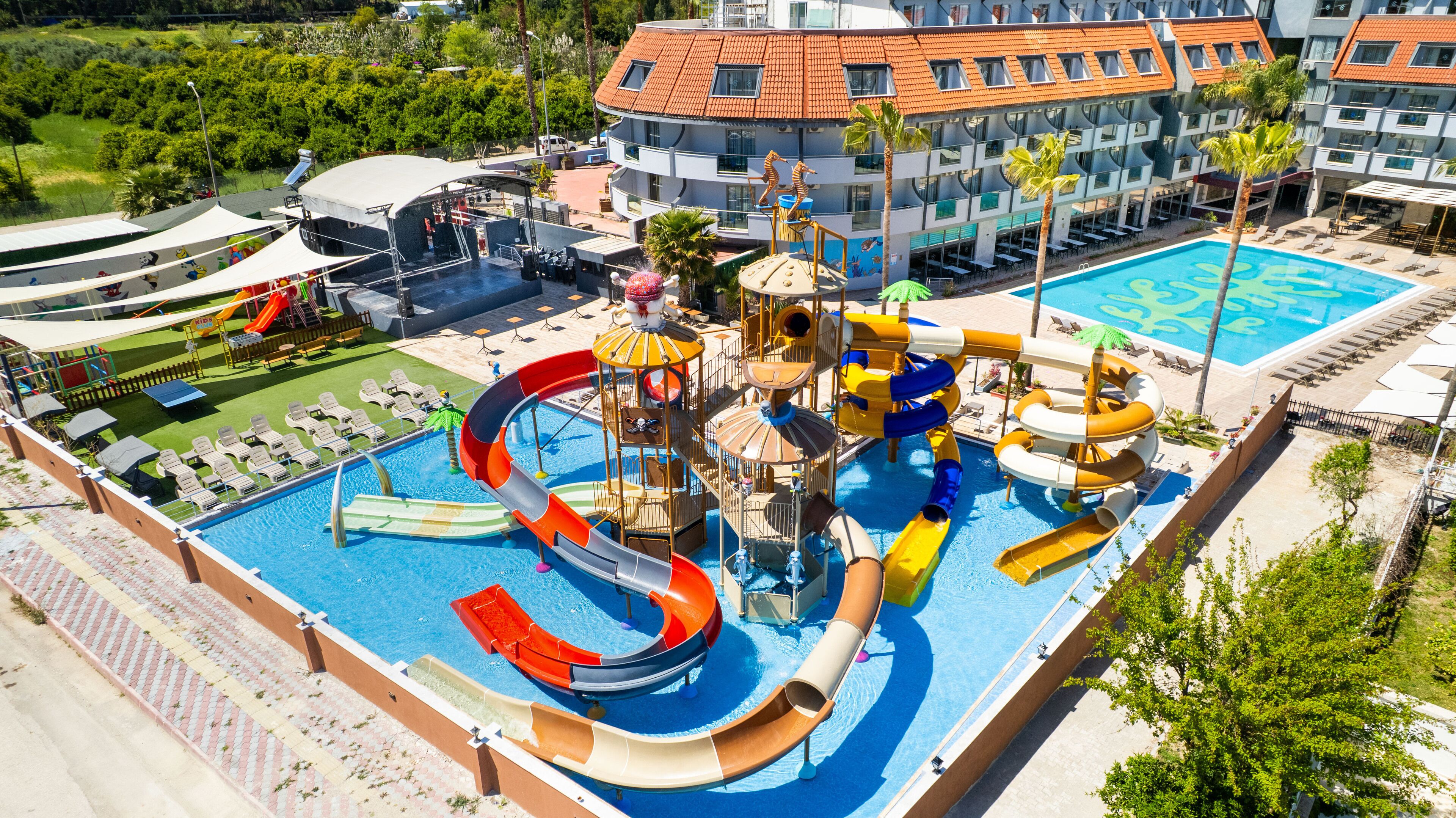 Indoor pool, seasonal outdoor pool, pool umbrellas, sun loungers