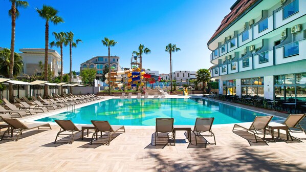 Indoor pool, seasonal outdoor pool, pool umbrellas, pool loungers