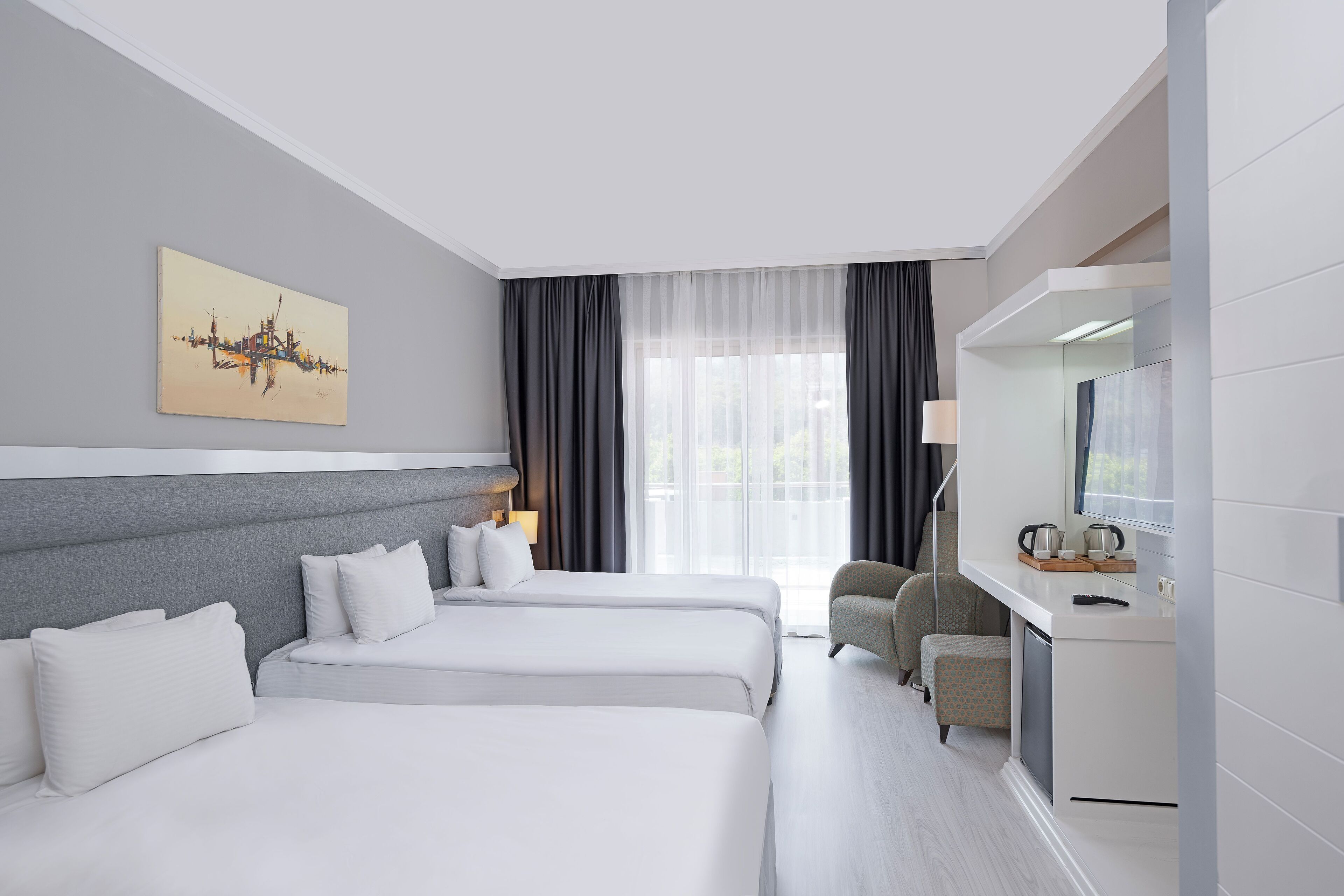 Luxe beddengoed, een minibar, een kluis op de kamer, geluiddichte muren