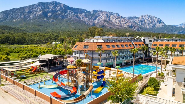 A resort with a pool area, water slides, and a stage for events. - Dedeman Kemer Resort - Ultra All Inclusive (Kemer)