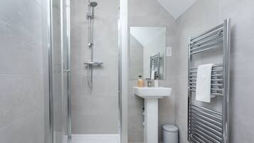 Hair dryer, towels, soap, shampoo