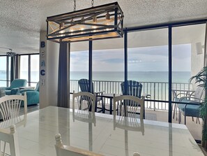 Condo, Multiple Beds, Balcony, Ocean View (Windward 601 - No Pets) | Outdoor dining