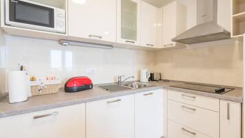 Apartment (One Bedroom Apartment with Balcony an) | Private kitchen | Fridge