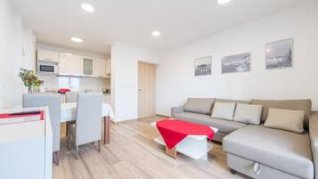 Apartment (One Bedroom Apartment with Balcony an) | Living room | TV