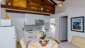 Apartment (One-Bedroom Apartment with Terrace an) | Living room | TV