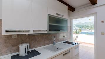 Apartment (One-Bedroom Apartment with Terrace an) | Private kitchenette | Fridge