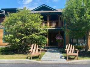 Relax on the upper balcony or unwind on the front lawn with Adirondack chairs.