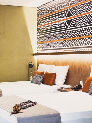 Quarto superior | Frigobar, berços grátis, Wi-Fi de cortesia, roupa de cama