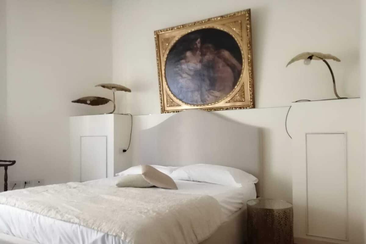 Habitación cuádruple Deluxe | Cortinas blackout, tabla de planchar con plancha y wifi gratis