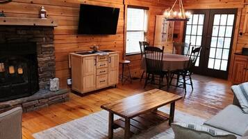 Smart TV, fireplace, DVD player, books