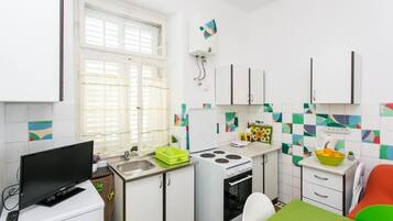 Apartment (Two Bedroom Apt,terrace,garden view) | Private kitchen | Fridge