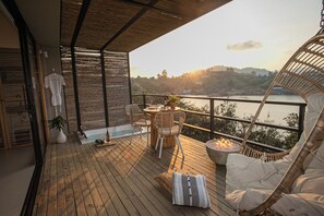 Luxe beddengoed, pillowtop-bedden, een minibar, verduisterende gordijnen