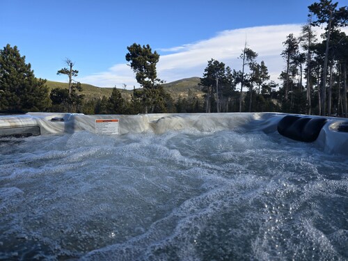 Our Property offers a relaxing getaway with a hot tub and massage chair!