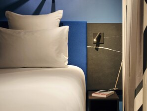 Ropa de cama de alta calidad, colchones con pillow-top y minibar 