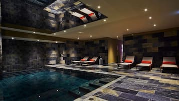 Indoor pool, open 9:00 AM to 8:00 PM, pool loungers