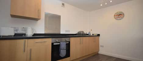 Fridge, microwave, oven, coffee/tea maker
