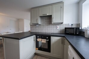 Fridge, microwave, oven, coffee/tea maker