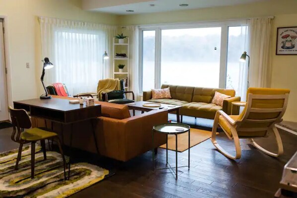 Living room with desk workspace