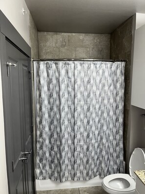 Combined shower/bathtub