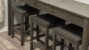 A wooden desk with a drawer and two stools. - Newly 5 Star Rental (New York)