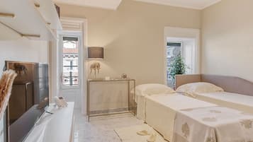 2 bedrooms, blackout curtains, soundproofing, iron/ironing board