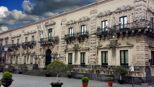 A historic building with ornate facades, multiple balconies, and a central entrance with steps. - Detached house: relaxation.  CIR 19087053C261141 CIN IT087053C2WIFBFSGJ (Sicilia)