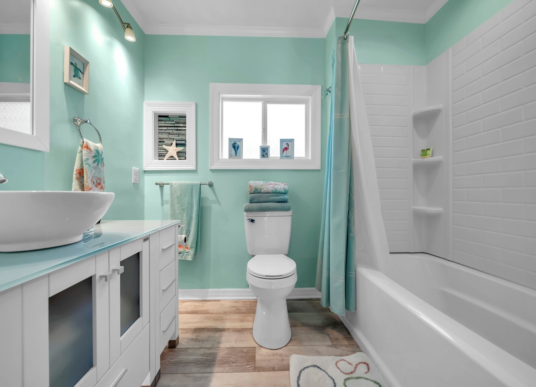 Bathtub, hair dryer, towels, soap
