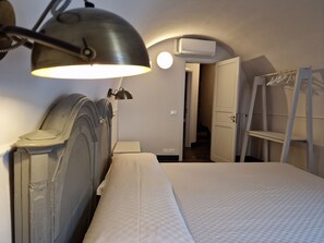 Coffres-forts dans les chambres, fer et planche à repasser