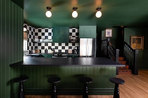 Orville's Lodge | Private kitchen | Full-sized fridge, microwave, coffee/tea maker, electric kettle