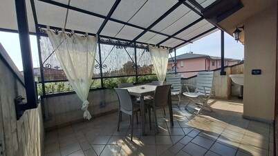 Large penthouse with terraces + closed parking space -served by public transport